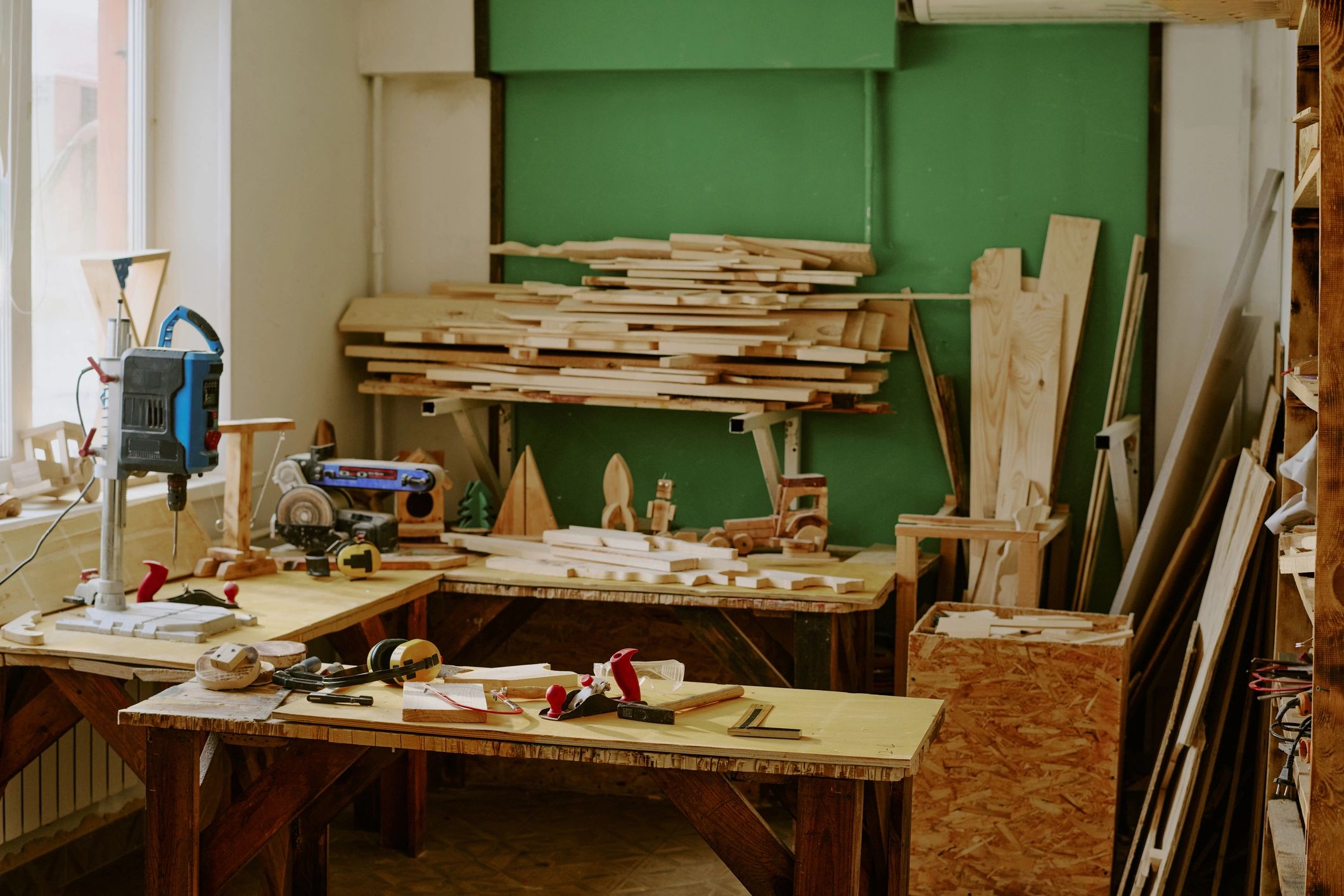 Workshop displaying power tools and lumber